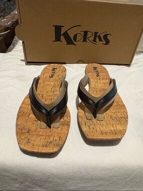 NIB Korks black flip flop size 9.